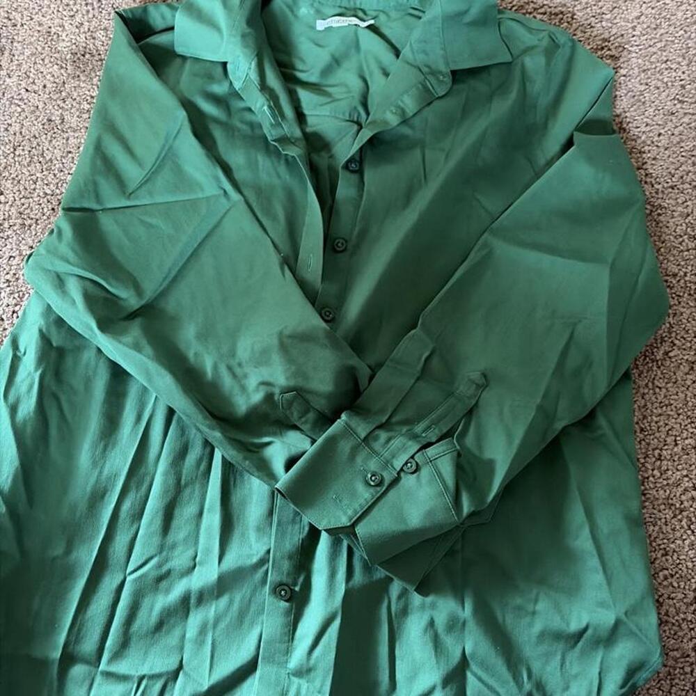 Green button up blouse with a relaxed fit